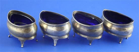 A set of four George III silver boat shaped salts(-)